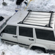 Image for article titled A Tesla Engineer's Jeep Ended Up Under 10 Feet of Snow for Months and It's Still There